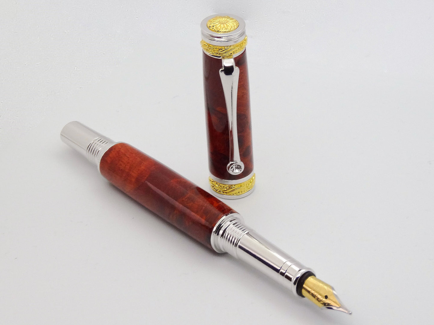 Majestic Jr. Fountain Pen in 22 Kt Gold, Rhodium and Red Amboyna Burl